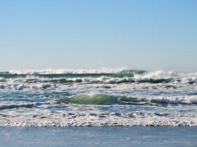 white-capped waves at the beach