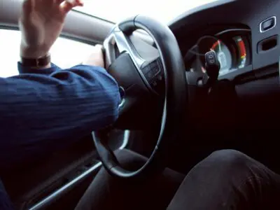 driver turning the wheel before an accident