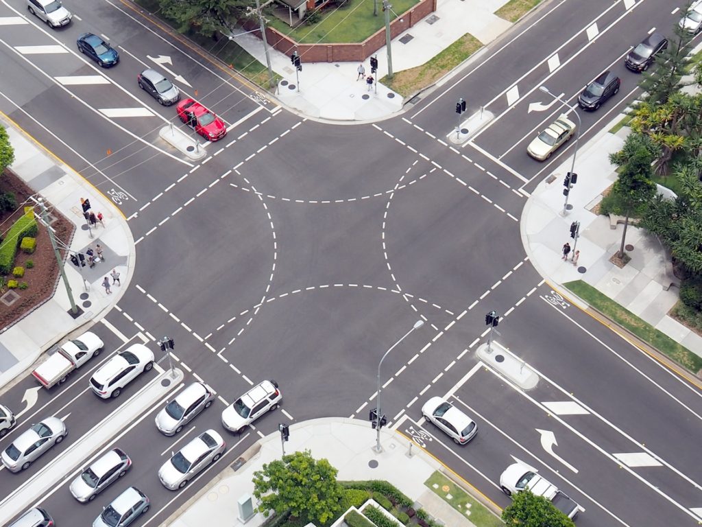 aerial view of busy four-way intersection
